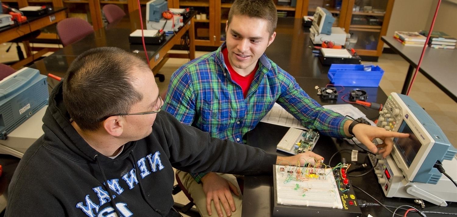 Students using electrical equipment 